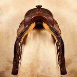 Elatheria Maverick hand tooled basketweave full grain western leather saddle silver conchos