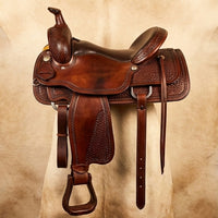 Elatheria Maverick hand tooled basketweave full grain western leather saddle silver conchos