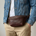 Elatheria Roamer full grain leather belt bag crossbody sling with brass hardware
