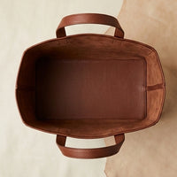 Elatheria Hearthstone pebbled full grain tan leather luxury firewood log carrier