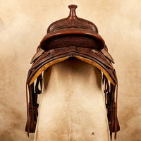 Elatheria Maverick hand tooled basketweave full grain western leather saddle silver conchos