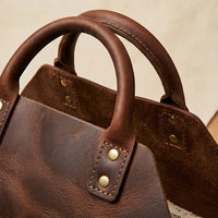 Elatheria Hearthside luxury high grain leather log carrier tote with brass hardware