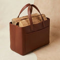 Elatheria Hearthstone pebbled full grain tan leather luxury firewood log carrier