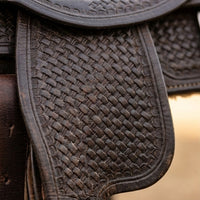 Elatheria Maverick hand tooled basketweave full grain western leather saddle silver conchos
