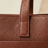 Elatheria Hearthstone pebbled full grain tan leather luxury firewood log carrier