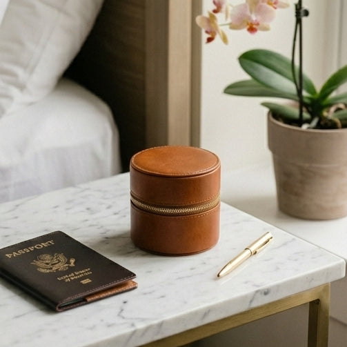 Elatheria Heirloom cylindrical tan leather travel jewelry case brass zipper ring roll