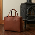 Elatheria Hearthstone pebbled full grain tan leather luxury firewood log carrier