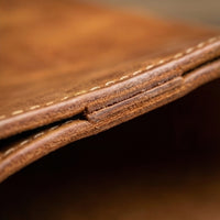 Elatheria Hearthside full grain leather firewood log carrier with brass hardware