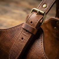 Elatheria Hearthside full grain leather firewood log carrier with brass hardware