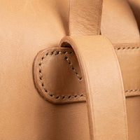 Elatheria Voyager minimalist full grain veg tanned leather roll top backpack
