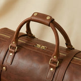 The Voyager leather weekender bag — open interior showing main compartment