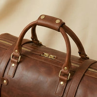 The Voyager leather weekender bag — open interior showing main compartment
