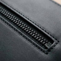 Elatheria Minimalist premium matte black leather laptop portfolio sleeve case