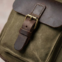 Troubadour waxed canvas gig bag interior padding detail, secure fit for acoustic guitars