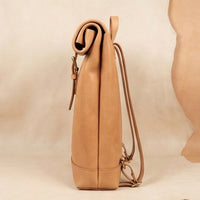 Elatheria Voyager minimalist full grain veg tanned leather roll top backpack