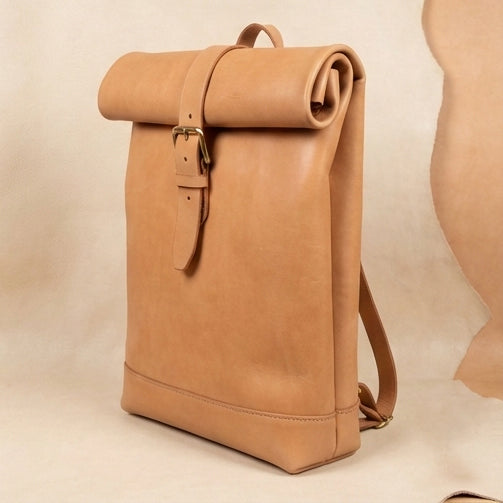 Elatheria Voyager minimalist full grain veg tanned leather roll top backpack