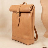Elatheria Voyager minimalist full grain veg tanned leather roll top backpack