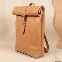 Elatheria Voyager minimalist full grain veg tanned leather roll top backpack
