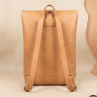 Elatheria Voyager minimalist full grain veg tanned leather roll top backpack