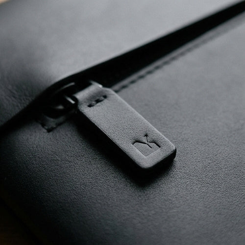 Elatheria Minimalist premium matte black leather laptop portfolio sleeve case