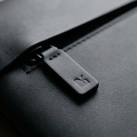 Elatheria Minimalist premium matte black leather laptop portfolio sleeve case