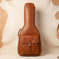 Elatheria Maestro cognac pull-up leather padded guitar gig bag backpack, front view, gift for guitarist