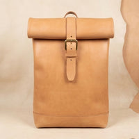 Elatheria Voyager minimalist full grain veg tanned leather roll top backpack