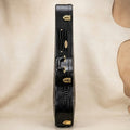 Maestro alligator-embossed hard case angled view showing deep textured leather grain