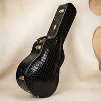 Maestro alligator-embossed case close-up of gold hardware, personalised initials engraving available