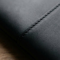 Elatheria Minimalist premium matte black leather laptop portfolio sleeve case