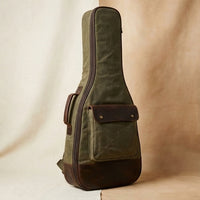 Troubadour waxed canvas bag close-up of riveted side handle, personalised initials available