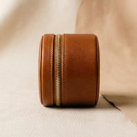 Elatheria Heirloom cylindrical tan leather travel jewelry case brass zipper ring roll