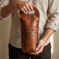 Elatheria Vintner handcrafted full grain leather single wine bottle carrier tote