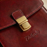 Elatheria Scribe vertical full grain leather crossbody mini briefcase in burgundy