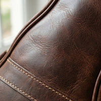 Session leather gig bag close-up of neck pocket and lower pocket, personalised initials embossing available