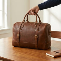 The Voyager heritage leather duffle bag — side profile view