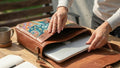 Elatheria Muse abstract art embroidered leather messenger bag fits 14 inch laptop