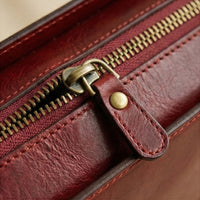 Elatheria Scribe vertical full grain leather crossbody mini briefcase in burgundy