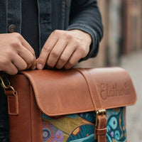 Elatheria Muse abstract art embroidered leather messenger bag fits 14 inch laptop