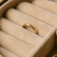 Elatheria Heirloom cylindrical tan leather travel jewelry case brass zipper ring roll