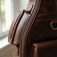 Session leather gig bag interior padding detail, secure fit for dreadnought and concert acoustic guitars