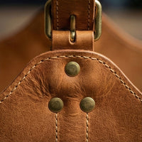 Elatheria Hearthside full grain leather firewood log carrier with brass hardware