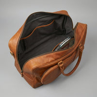 The Match Point personalised leather tennis duffle bag — front view, Elatheria