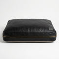 The Haven black leather dog bed front view on white background