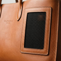 Mesh ventilation panel detail on The Voyager leather pet carrier