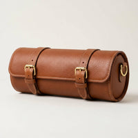 The Voyager rolled leather travel feeding case for dogs and cats, hero shot with brass buckles