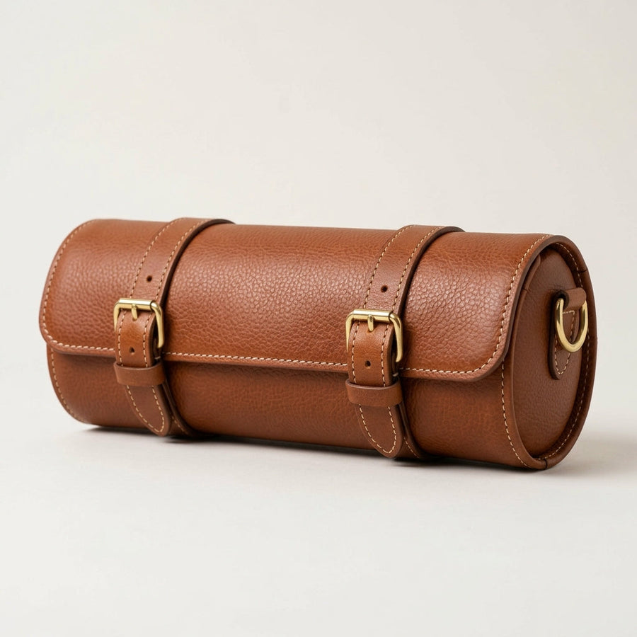 The Voyager rolled leather travel feeding case for dogs and cats, hero shot with brass buckles