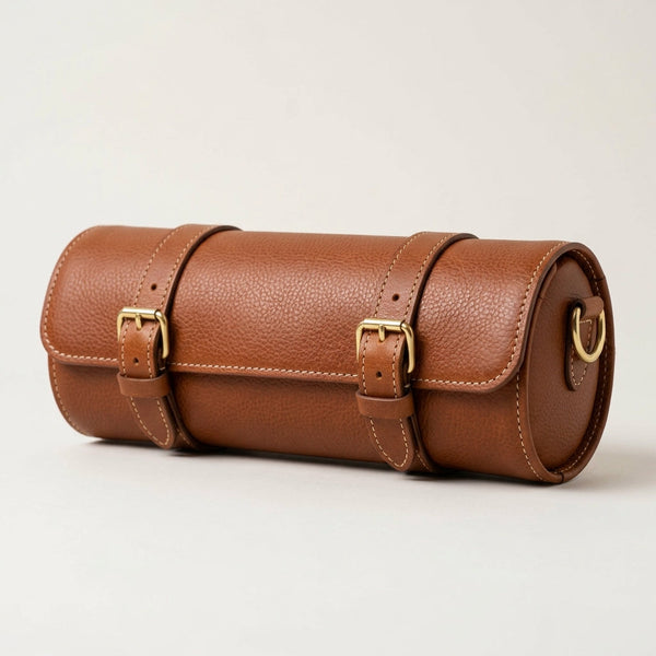 The Voyager rolled leather travel feeding case for dogs and cats, hero shot with brass buckles