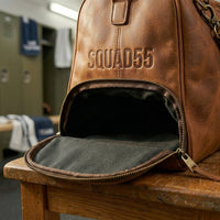 Separate shoe compartment on The Match Point leather tennis duffle bag