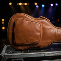 Stagehand leather guitar bag lifestyle carry shot, thoughtful gift for him or gift for her